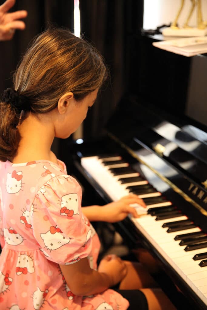 Student Playing the Piano
